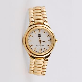 GIVENCHY Montre bracelet en acier brillant doré - Joyas y relojes - Plazzart