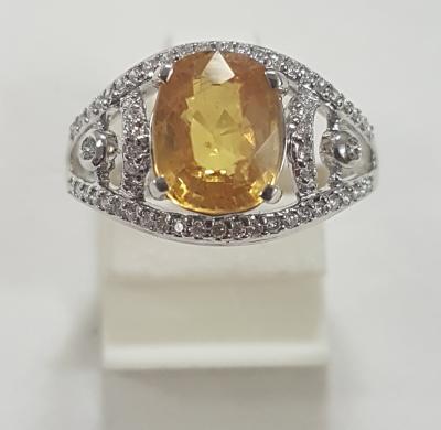 Bague ajourée or blanc 4g05 centre Saphir jaune taille ovale 2,85cts 2