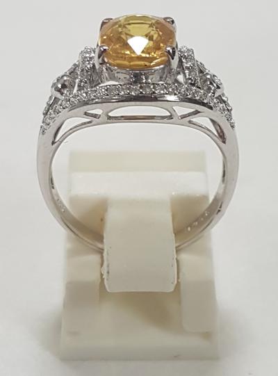 Bague ajourée or blanc 4g05 centre Saphir jaune taille ovale 2,85cts 2