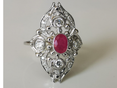RING in white gold, set in the middle with a  RUBY of 0.76 ct and DIAMONDS 2