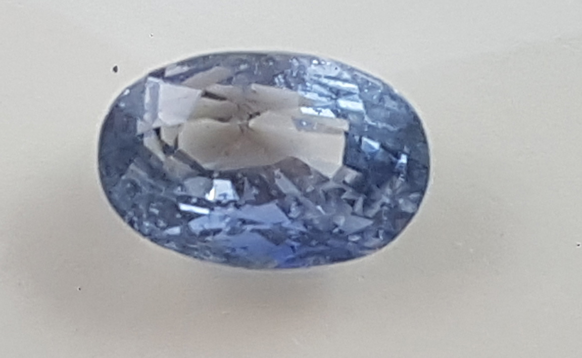 Saphir bleu 0.75 carat ovale non chauffé main image 1