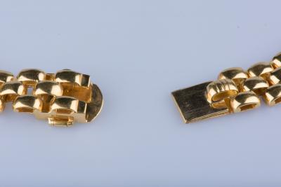 Collier panthère en or jaune 18 ct 26 saphirs baguettes 24 saphirs baguettes 4 rubis 96 diamants env. 1.92 ct au total 2