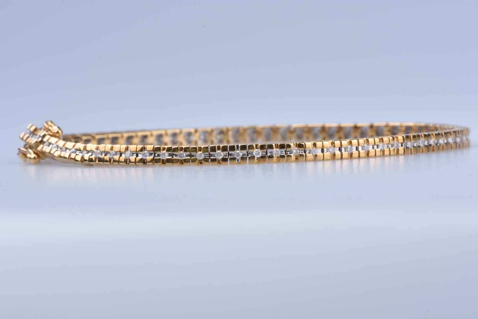 Bracelet Sterlé Paris, or jaune, platine, diamants.