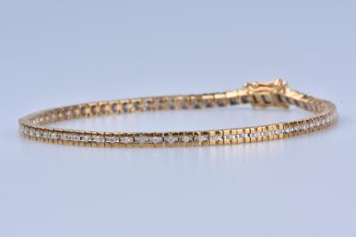 Bracelet en or jaune 18 ct (750/1000). 71 diamants 0,71 ct au total. 2