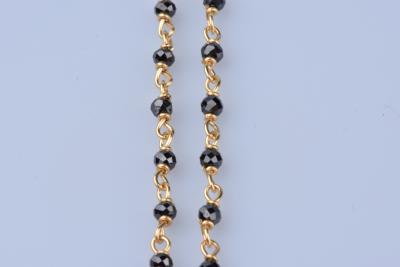 Collier en or jaune 18 ct (750/1000), 53 pierres semi-précieuses noires. 2