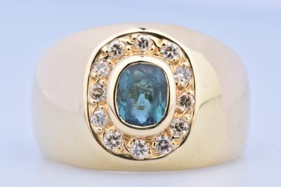 Bague en or jaune 18 ct ornée de 12 diamants ronds brillants et d’1 topaze ovale bleu ambre 2