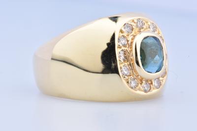 Bague en or jaune 18 ct ornée de 12 diamants ronds brillants et d’1 topaze ovale bleu ambre 2