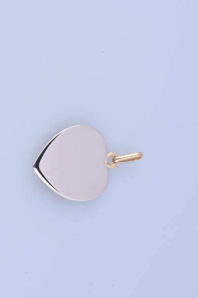 Magnifique pendentif coeur en or blanc 18 ct (750 millièmes), orné de 2 rubis carrés 0.02ct au total, mention 