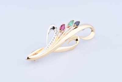 Broche ronde en or composée de 3 pierres précieuses 2