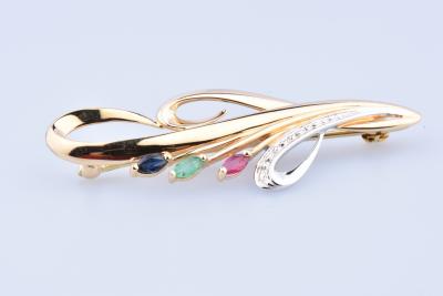 Broche ronde en or composée de 3 pierres précieuses 2