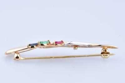 Broche ronde en or composée de 3 pierres précieuses 2