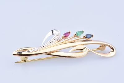 Broche ronde en or composée de 3 pierres précieuses 2