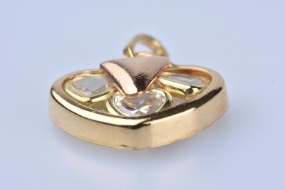 Heart pendant in 18 ct yellow gold (750/1000) decorated with 3 oxides 2