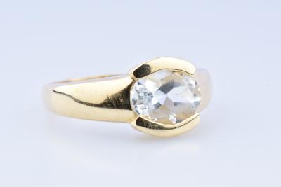 Bague solitaire en or jaune 18 carats (750 millièmes) agrémentée d’1 oxyde de zirconium. 2