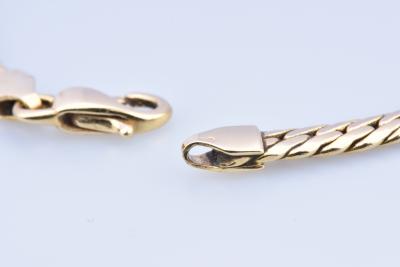 Magnifique bracelet en or jaune 18 carats (750 millièmes) en maille serpent. Fermoir mousqueton. 2