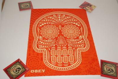 Shepard FAIREY (Obey) & Ernesto YERENA,  Day of the dead skull Orange 1/2, 2018, Techniques mixtes, signée 2