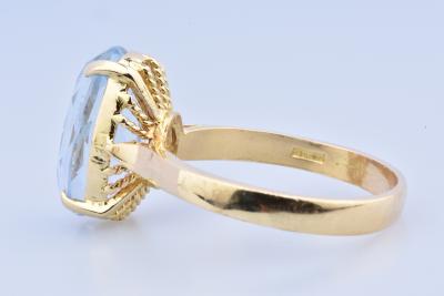 Bague en or jaune 18 carats composée d’une topaze 2