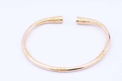 Magnifique bracelet jonc massif en or jaune 18 carats (750 millièmes). 2