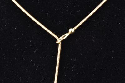 Collier en or jaune 18 carats (750 millièmes). Chaine en maille serpent. 2