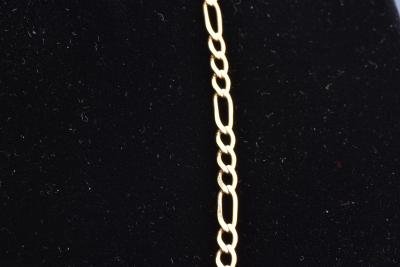 Beau collier homme en or jaune 18 carats (750 millièmes) - Chaine en mailles alternées 1/3.Fermoir mousqueton. 2