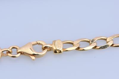 Beau collier homme en or jaune 18 carats (750 millièmes) - Chaine en mailles alternées 1/3.Fermoir mousqueton. 2