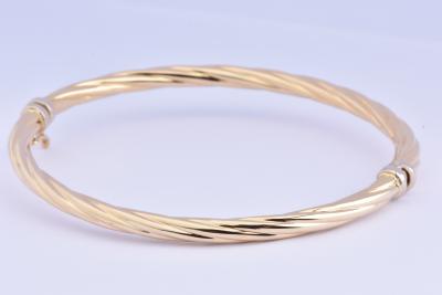 Bracelet rigide en or jaune 18 carats (750 millièmes). 2
