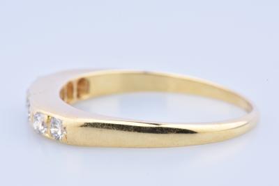 Bague en or jaune composée de 7 diamants 2