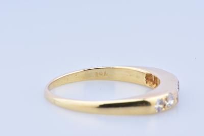 Bague en or jaune composée de 7 diamants 2