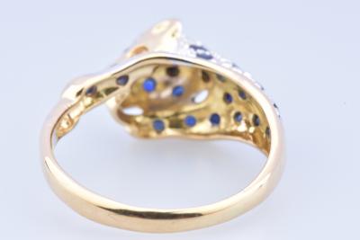 Bague panthère en or bicolore composée de 2 diamants taille brillant de 25 saphirs 2