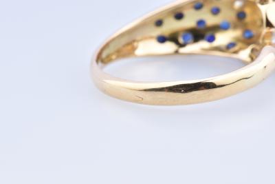 Bague panthère en or bicolore composée de 2 diamants taille brillant de 25 saphirs 2