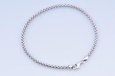 Bracelet femme en or blanc 18 carats (750 millièmes), fermoir mousqueton. 2