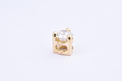 Pendentif en or jaune 18 carats (750/1000) orné d'un diamant taille brillant de 0.17 ct. 2