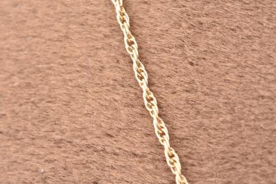 Collier en or jaune 18 carats (750/1000) orné d’un saphir, d’un rubis et d’un émeraude 2
