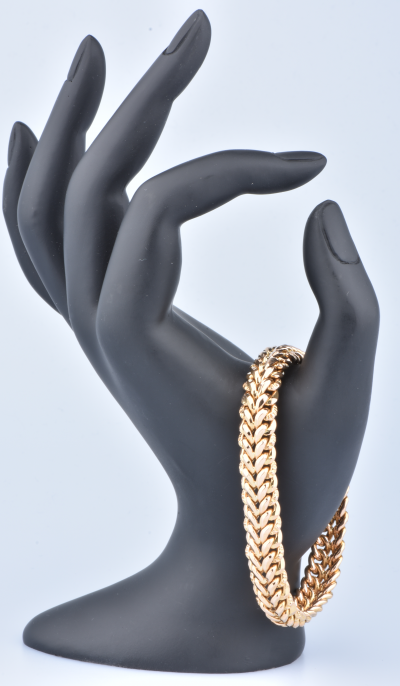 Bracelet en or 18 carats (750 millièmes), chaine double gourmette, fermoir tiroir sécurisé. 2