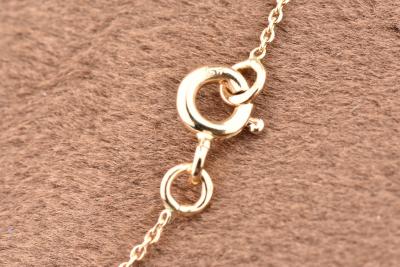 Chaine fine en or jaune 18k,  maille forçat, fermoir bouée. 2