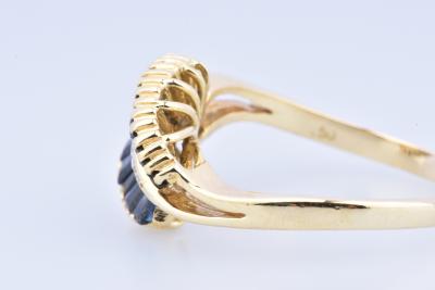 Bague en or jaune 18 carats, ornée de 14 saphirs baguette 2