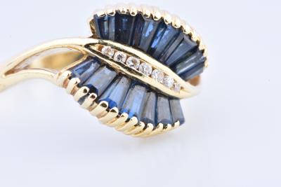 Bague en or jaune 18 carats, ornée de 14 saphirs baguette 2
