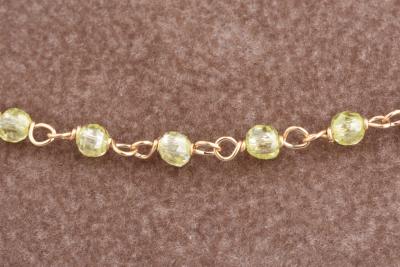 Collier en or jaune ornée de perles jaunes 2