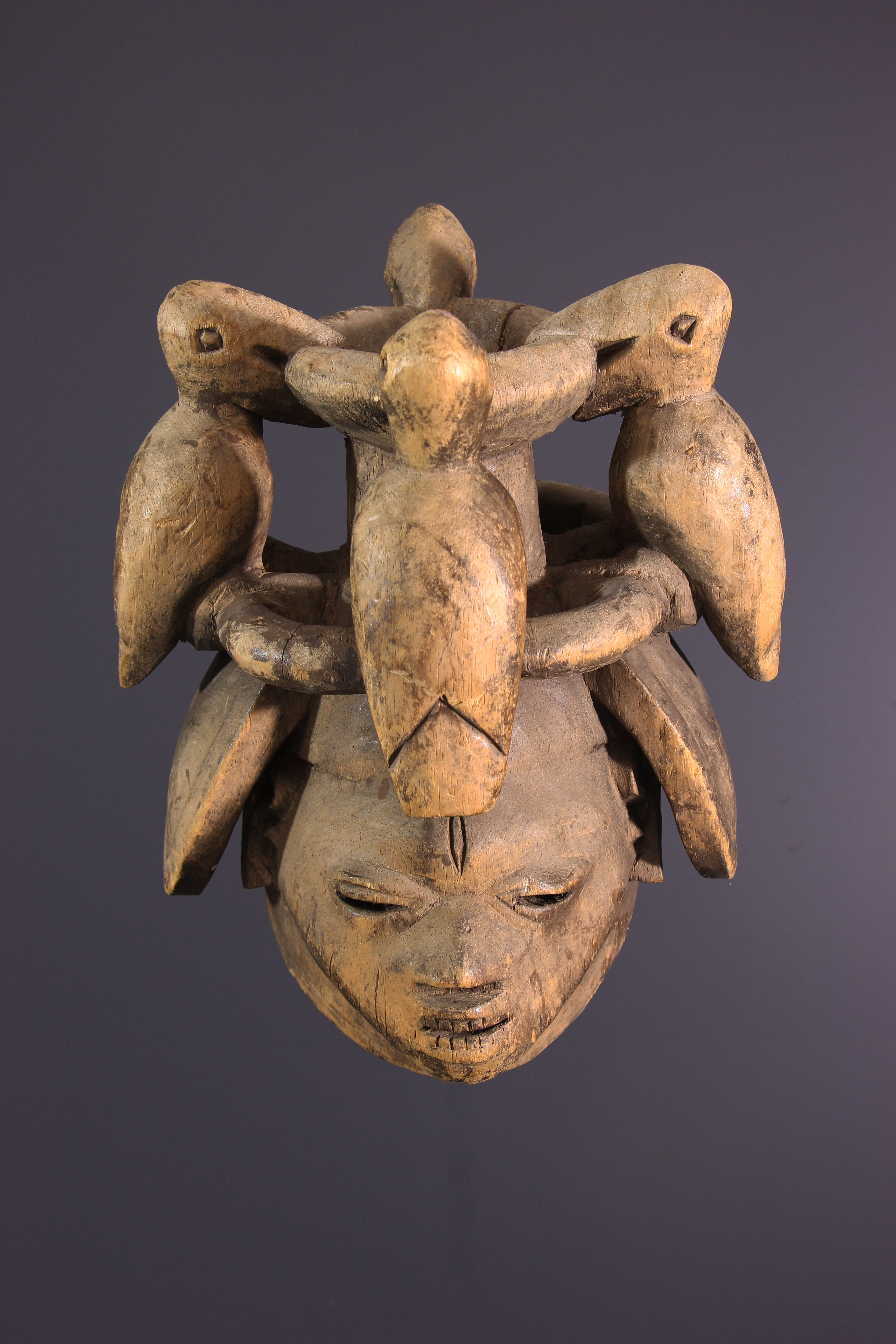 Yoruba, Nigeria: a head crest mask of the 'Gelede' type, with a male figure  carved out from the same piece. - Tribal Art - Africa 2016/06/09 - Starting  bid: EUR 1,800 - Dorotheum