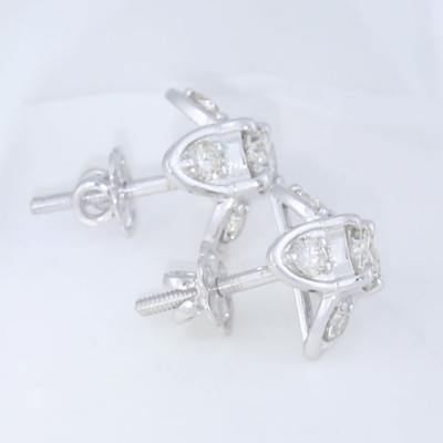 Boucles d’oreilles  en or blanc et diamants solitaires 2