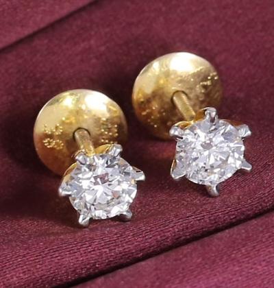 Boucles d’oreilles avec diamant solitaire en or jaune 2