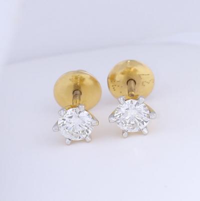 Boucles d’oreilles avec diamant solitaire en or jaune 2