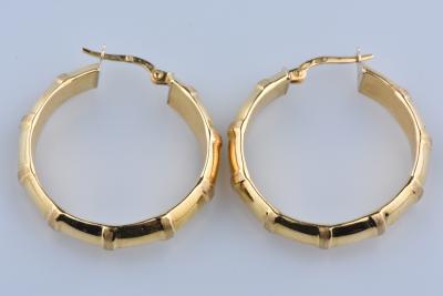 Boucles d’oreilles créole or jaune 18 carat. Style maille bambou 2