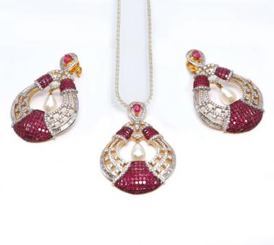 Parure composée d’un collier et de boucles d’oreilles en rubis et diamants 2