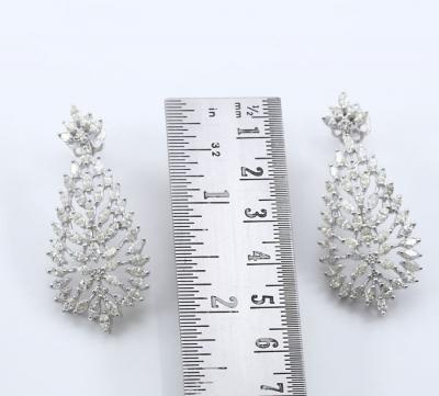 Boucles d’oreilles de créateur en or blanc et diamants 2