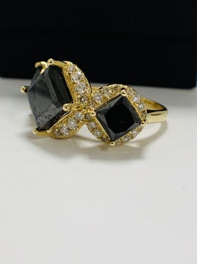 Bague trilogy en or jaune et diamants noirs 5.03ct 2