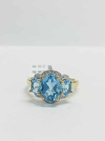 Bague or jaune topaze bleue et diamants 2