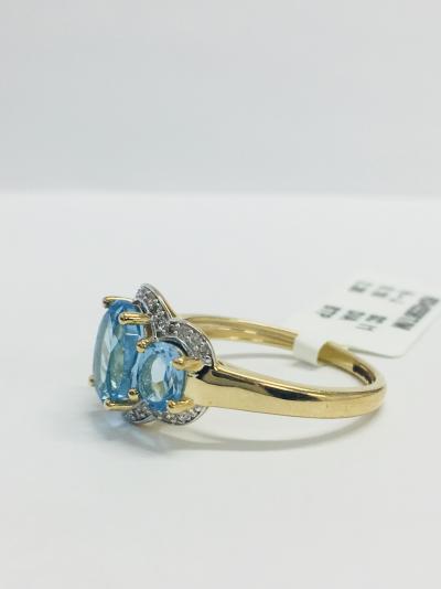 Bague or jaune topaze bleue et diamants 2