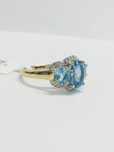 Bague or jaune topaze bleue et diamants 2