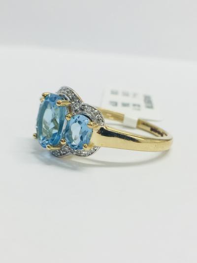 Bague or jaune topaze bleue et diamants 2